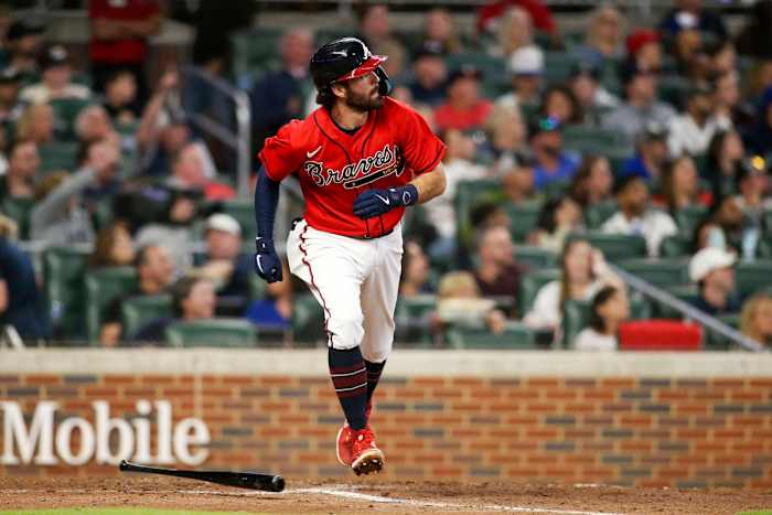 Braves shortstop Dansby Swanson hits a home run against the Mets in the sixth inning at Truist Park.